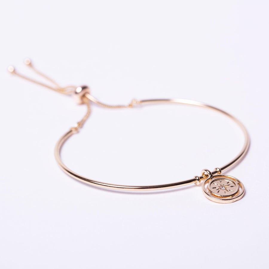Gold coin cuff bracelet with adjuster