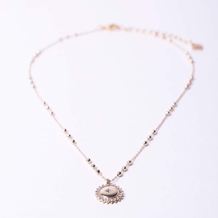 gold crystal pave medallion coin single necklace on station ball chain, jewellery layout