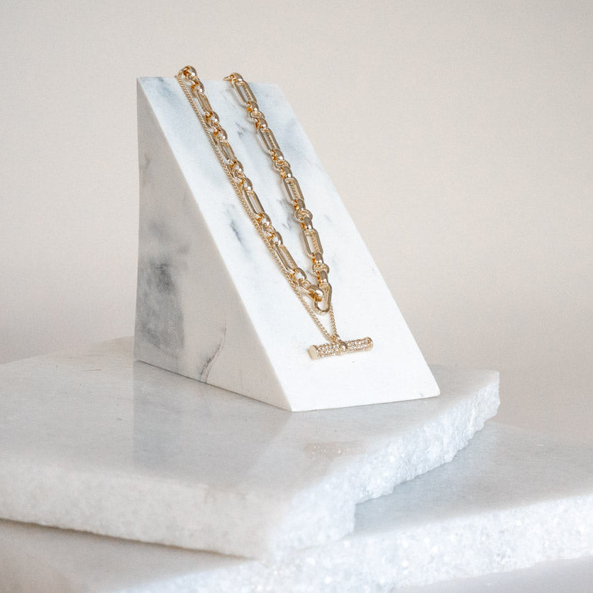 duo layer necklace with statement chain and curb chain pave t bar